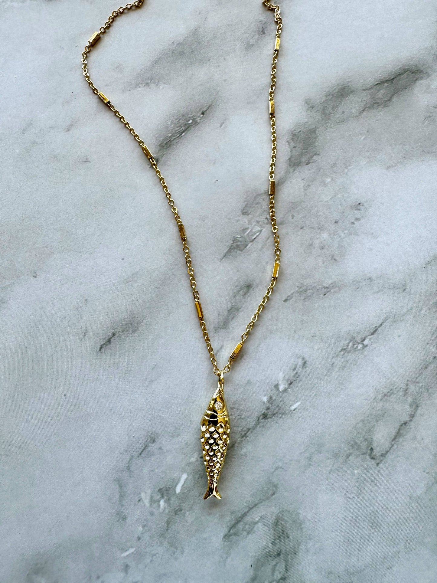 the PESCARE necklace